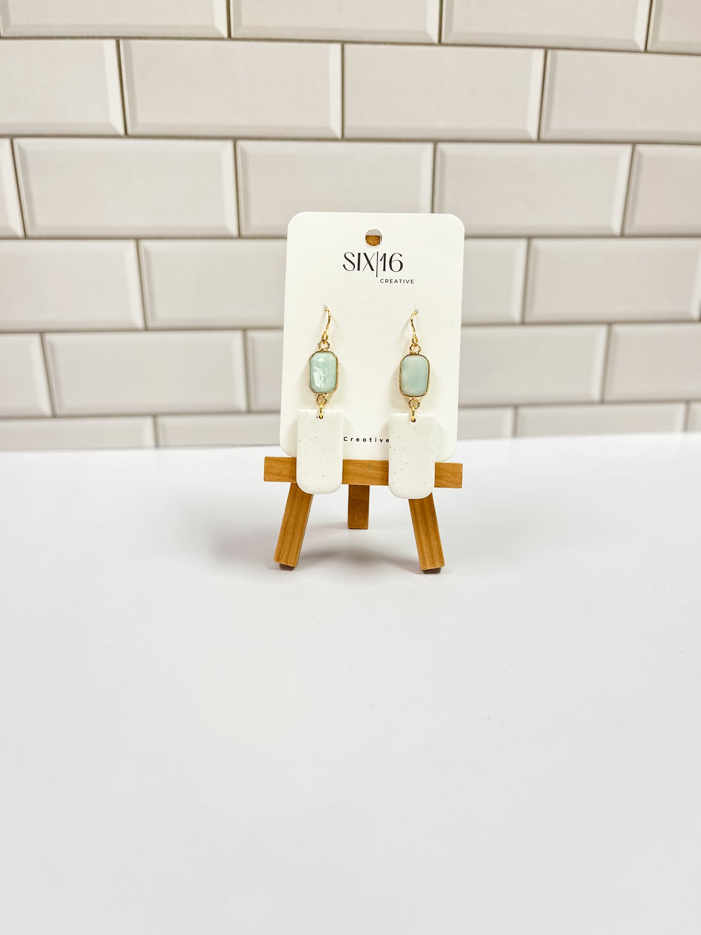 White Polymer Clay Earrings with Light Green Charm