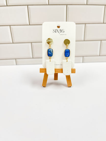 White Polymer Clay Earrings with Blue Charm