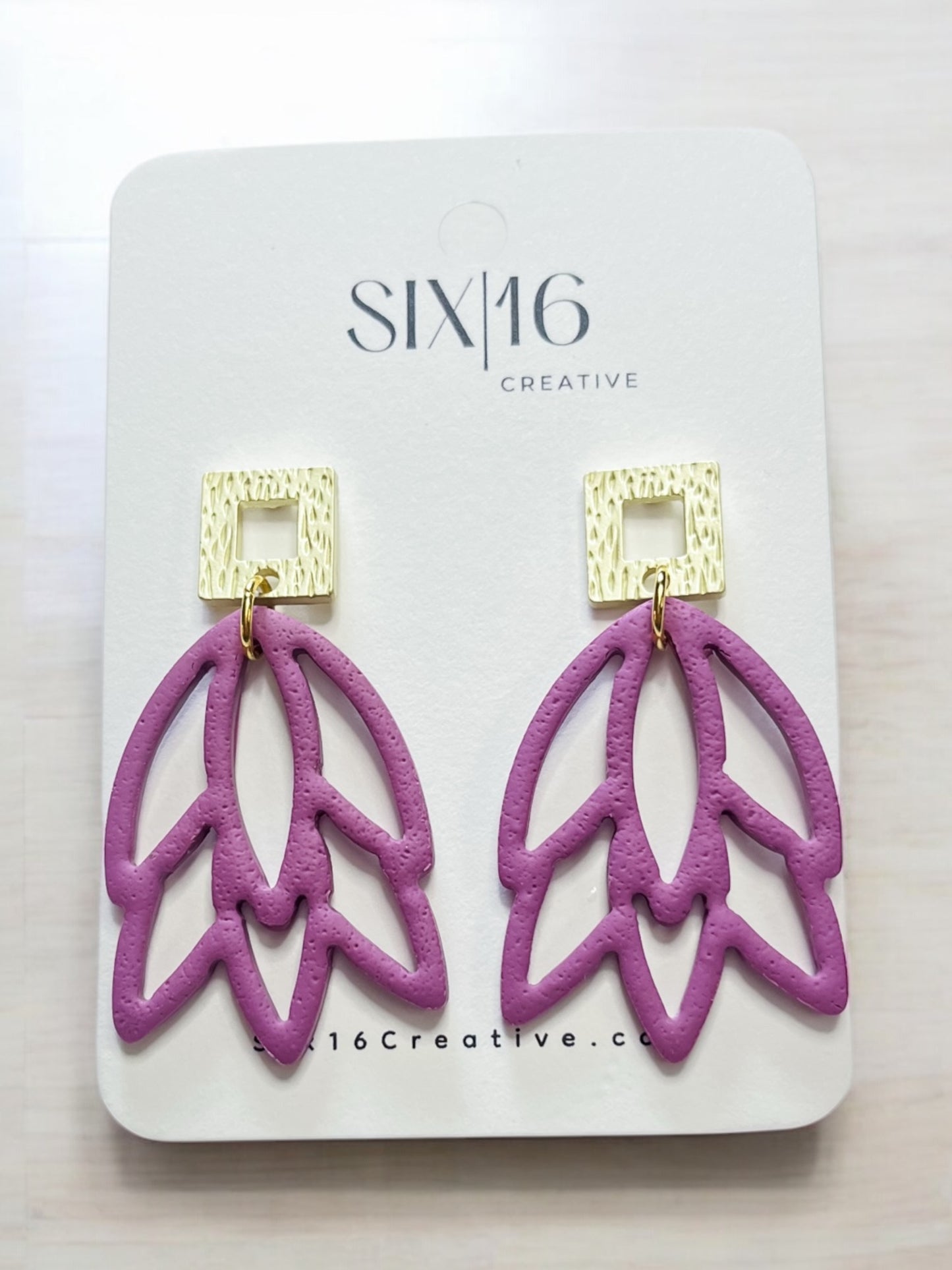 Mauve Flower Outline Clay Earrings